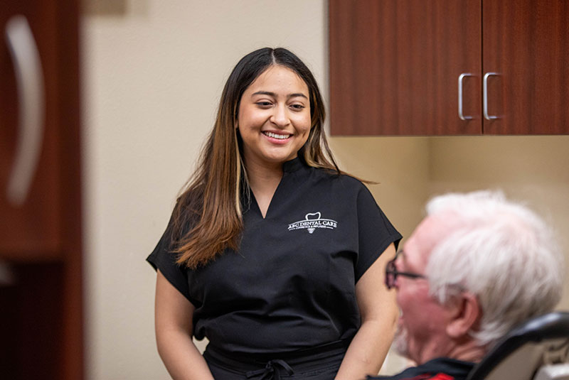 team member going over cost with patient