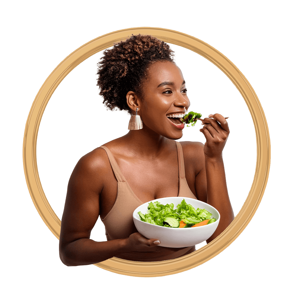 person enjoying their salad and smiling